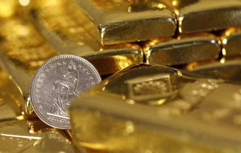 الذهب يتراجع مع توخي الحذر قبل قرار الفائدة الأمريكية