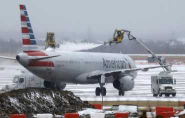 إلغاء آلاف الرحلات الجوية وانقطاع للكهرباء جراء العواصف في أميركا